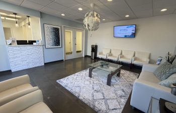 Modern waiting room with reception inside Dunwoody Dental Health dental office
