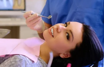 Patient getting dental checkup for composite fillings treatment