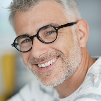 Handsome mature man with glasses Dunwoody Dental Health care
