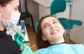 Cosmetic Dentistry patient smiling during dental visit
